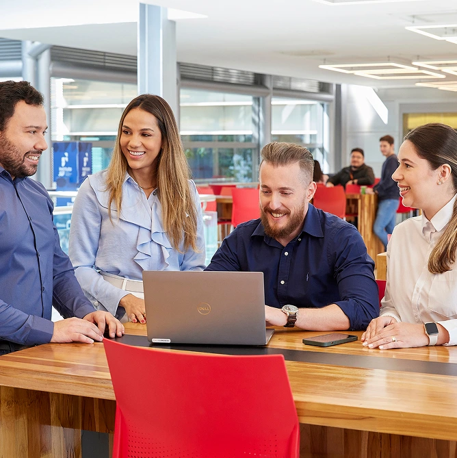 Colleagues working together at the JBS group
